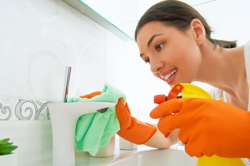 Local oven cleaner working in a Stockwell flat kitchen