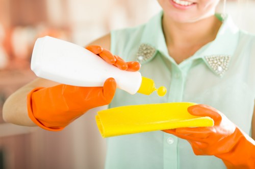 Deep cleaning a Stockwell flat living room with dusting and floor care